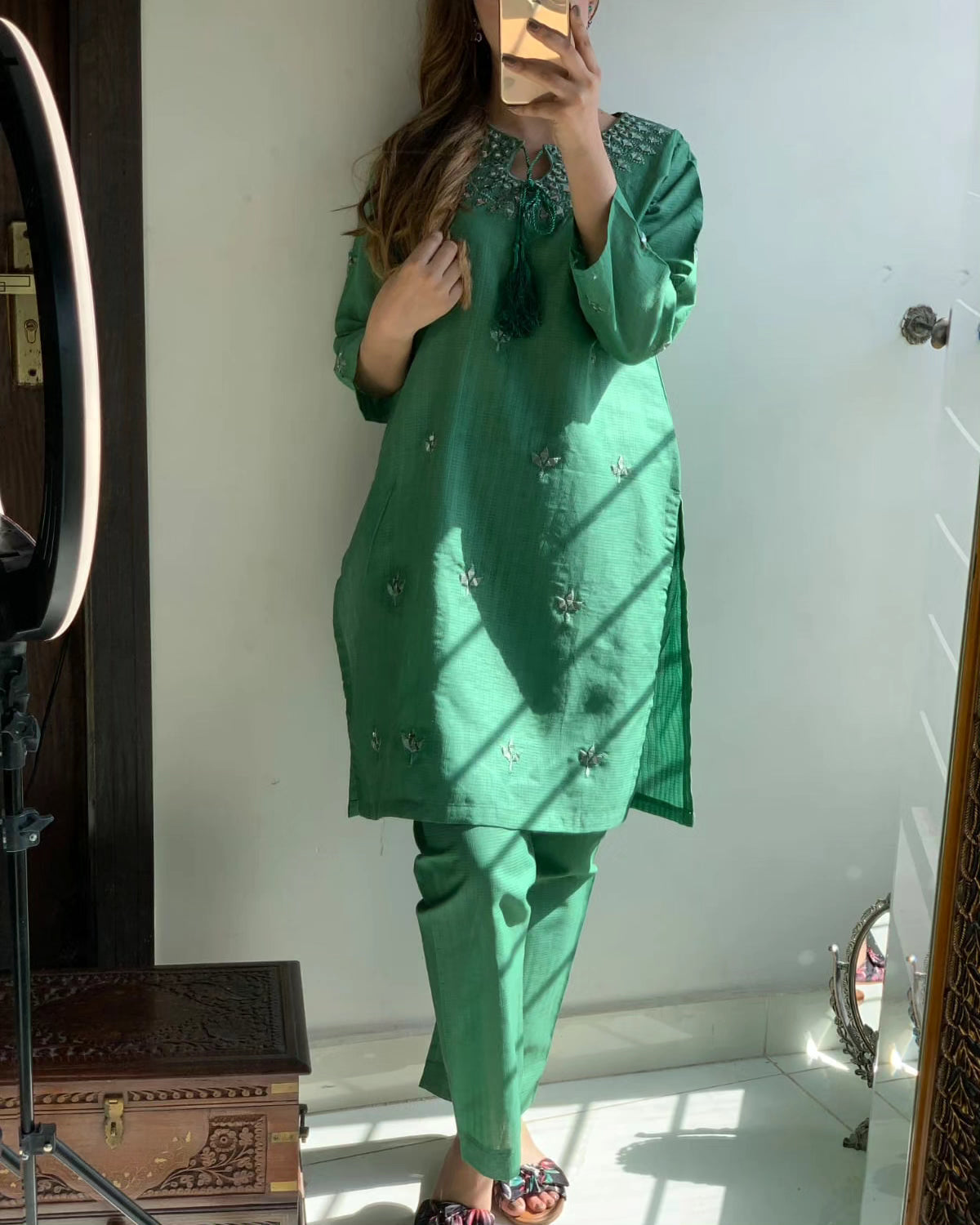 "Premium quality 2-piece stitched dress featuring intricate mirror embroidery."