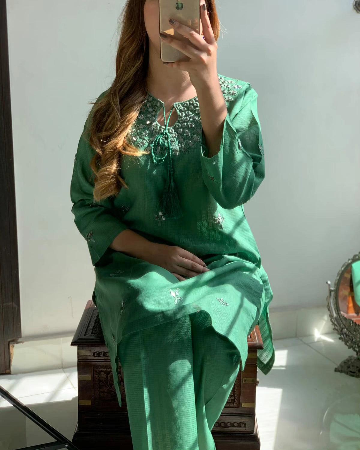 "Premium quality 2-piece stitched dress featuring intricate mirror embroidery."