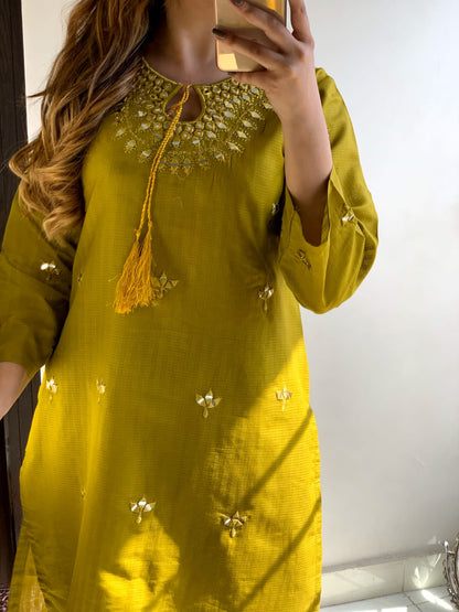 "Premium quality 2-piece stitched dress featuring intricate mirror embroidery."